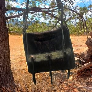 Hand made , leather , hide purses